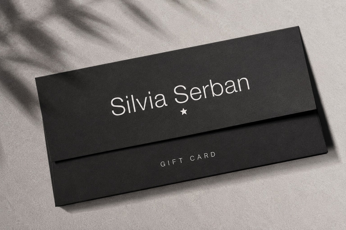 Silvia Șerban gift card in a black envelope
