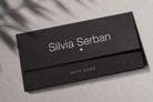 Silvia Șerban gift card in a black envelope